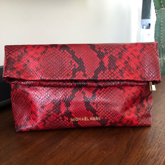 Michael Kors Handbags - Michael Kors Daria Clutch Python Embossed Leather